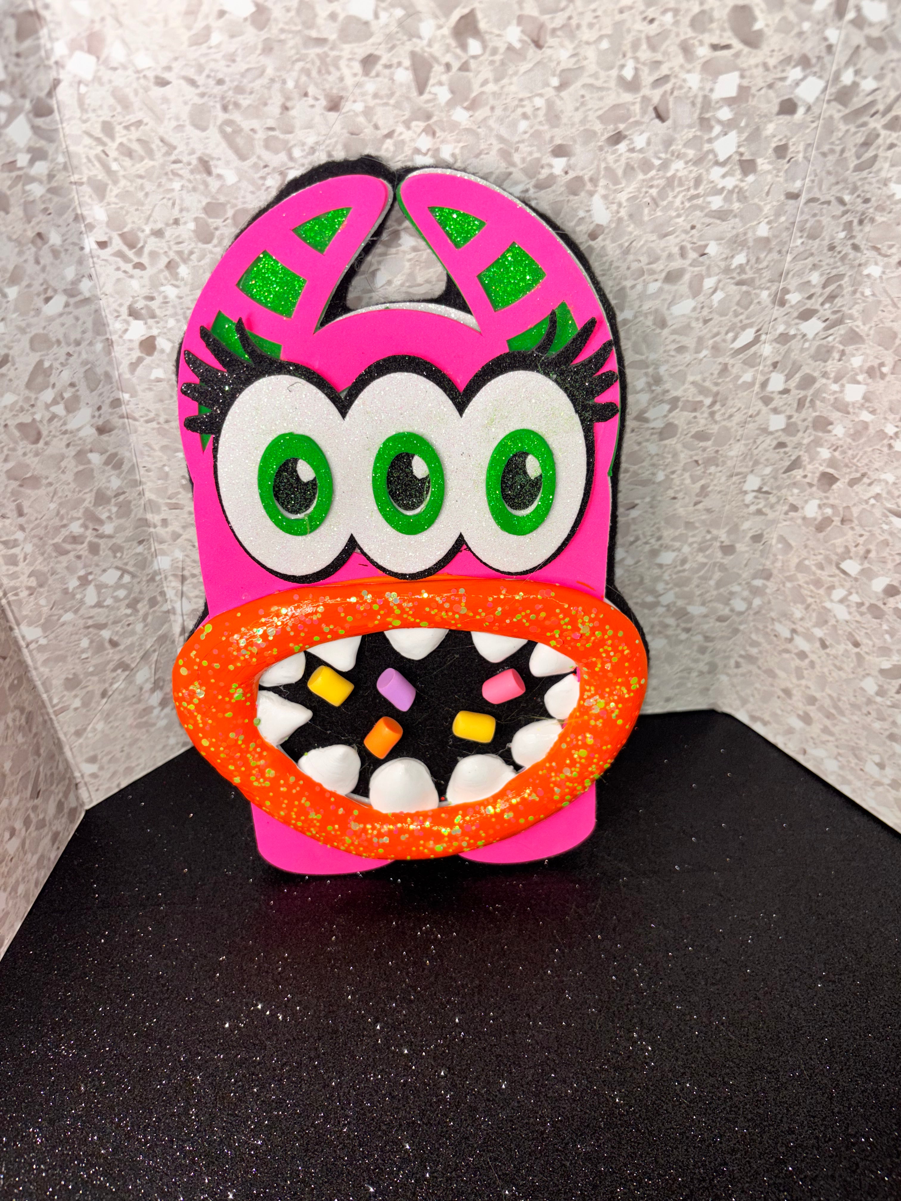 Blinky the cyclops The Perfect Accent For Adding A Fun And Spooky Touch To Your Halloween Decor. This Playful Character Is Designed To Easily Attach To A Wreath, Garland, Or Any Festive Display, Instantly Transforming It Into A Unique Centerpiece. This Si